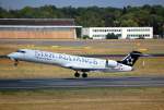 Hier hebt ein Canadair Regional Jet CRJ701ER D-ACPS der Lufthansa Regional CityLine in Berlin Tegel ab, 30.08.09.