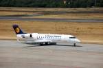 Canadair Regional Jet CRJ100LR D-ACJF der Lufthansa Regional (City Line) auf dem Weg zur Landebahn auf dem Flughafen Berlin-Tegel, 22.06.08.