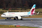 Eurowings Airbus A320-251N D-AENE rollt zum Terminal in Köln 26.1.2025