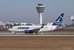 Tarom, YR-BGI  Iasi , B737-78J(W) bei der Landung in MUC aus Sibiu (SBZ) 16.03.2013