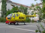 D-HGAB. MBB/Eurocopter BO 105 der ADAC Luftrettung als Christopf 31 auf einem Parkplatz in Berlin-Charlottenburg. Der BO 105 ist ausgemustert und durch den leiseren, strkeren Eurocopter EC 135 ersetzt worden. Der Traditionsname  Christopf 31  ist beibehalten worden. Er ist der meistbeschftigte Rettungsflieger bundesweit.(Foto:31.5.2003)