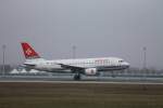 Airbus A319 von Air Malta bei der Landung am Airport Mnchen am 20.November 2011.