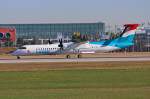 LX-LGE / Luxair / DHC 8-402Q in MUC beim Start nach Luxemburg (LUX) 02.08.2013